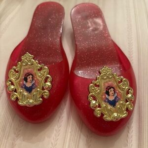 glittery Snow White dress-up shoes from the Disney Princess Shoe Boutique set.